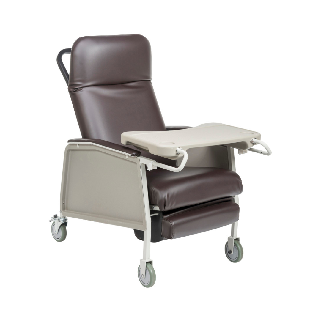 The Drive 3-Position Geri-Chair Recliner with Wheels features a brown padded seat and backrest, light gray armrests, leg support, foldable tray, and four caster wheels—perfect for patient care comfort and convenience.